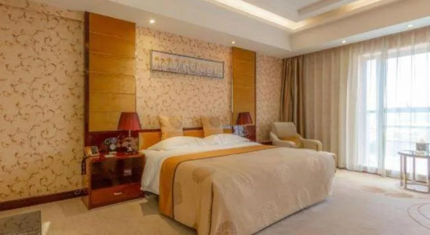 Bed in Xin Sheng Da Hong Sheng International Hotel