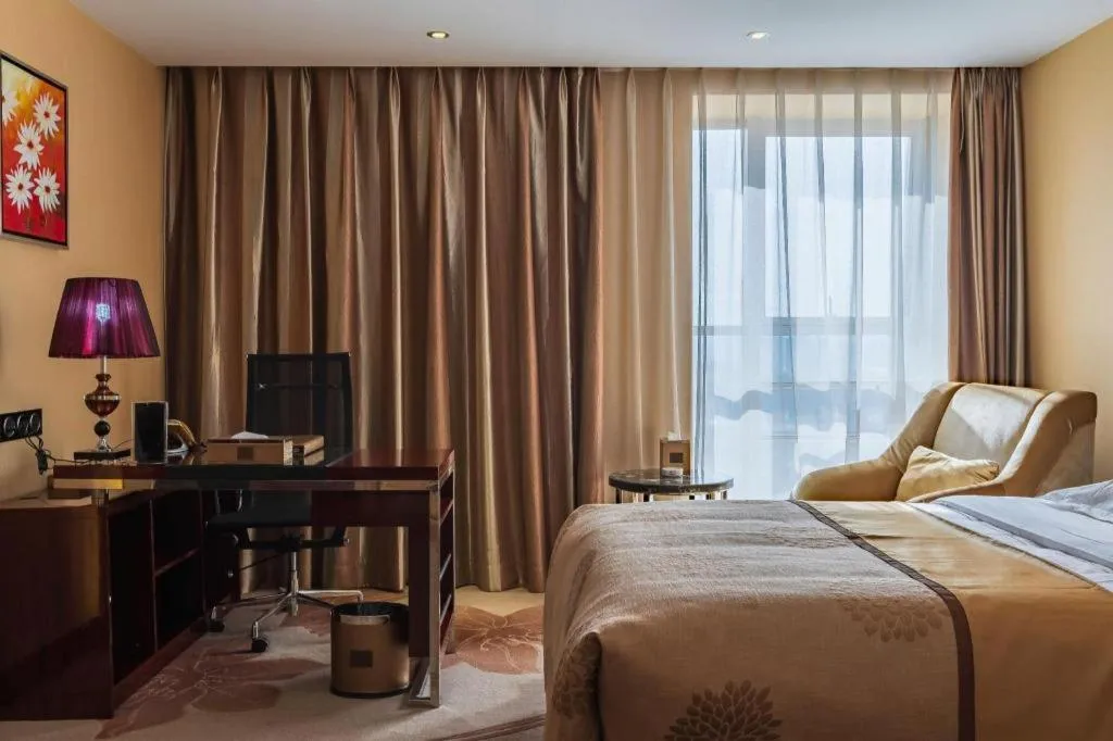 Bed in Xin Sheng Da Hong Sheng International Hotel