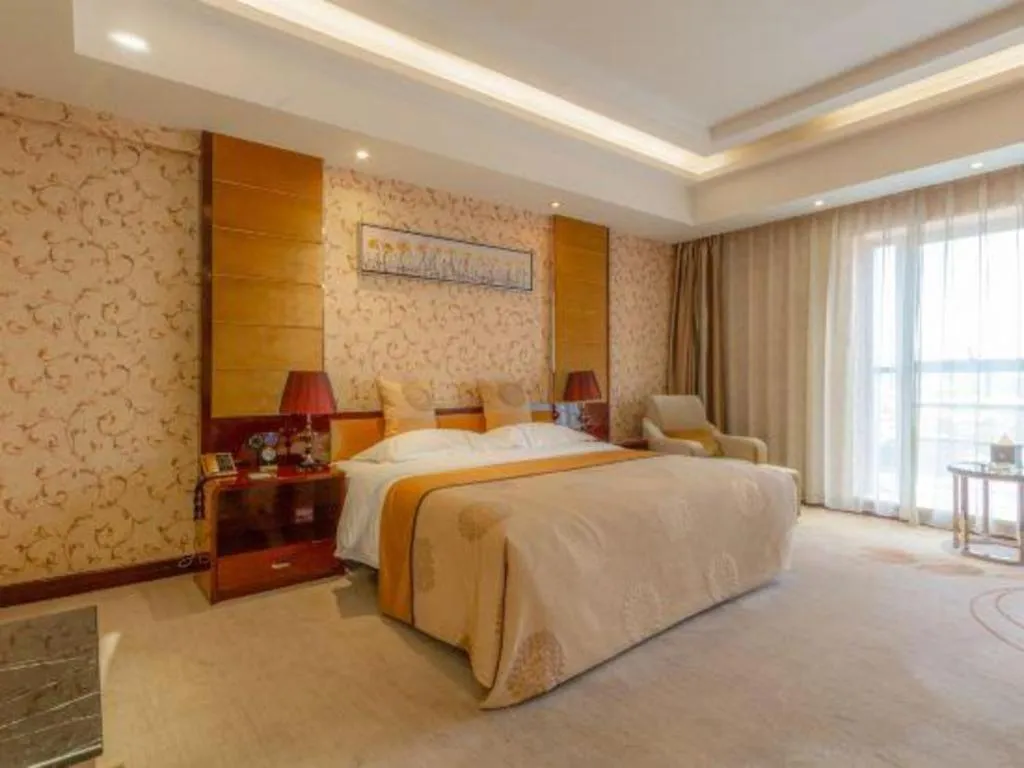 Bed in Xin Sheng Da Hong Sheng International Hotel