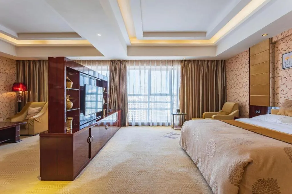 Bed in Xin Sheng Da Hong Sheng International Hotel