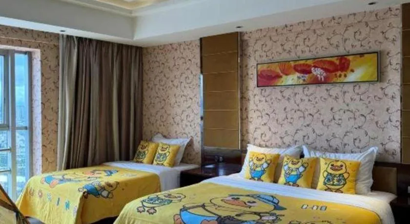 Bed in Xin Sheng Da Hong Sheng International Hotel