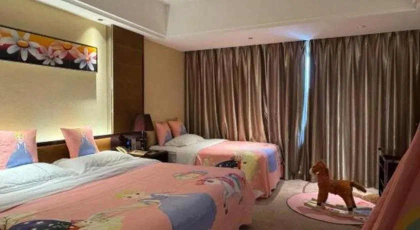 Bed in Xin Sheng Da Hong Sheng International Hotel