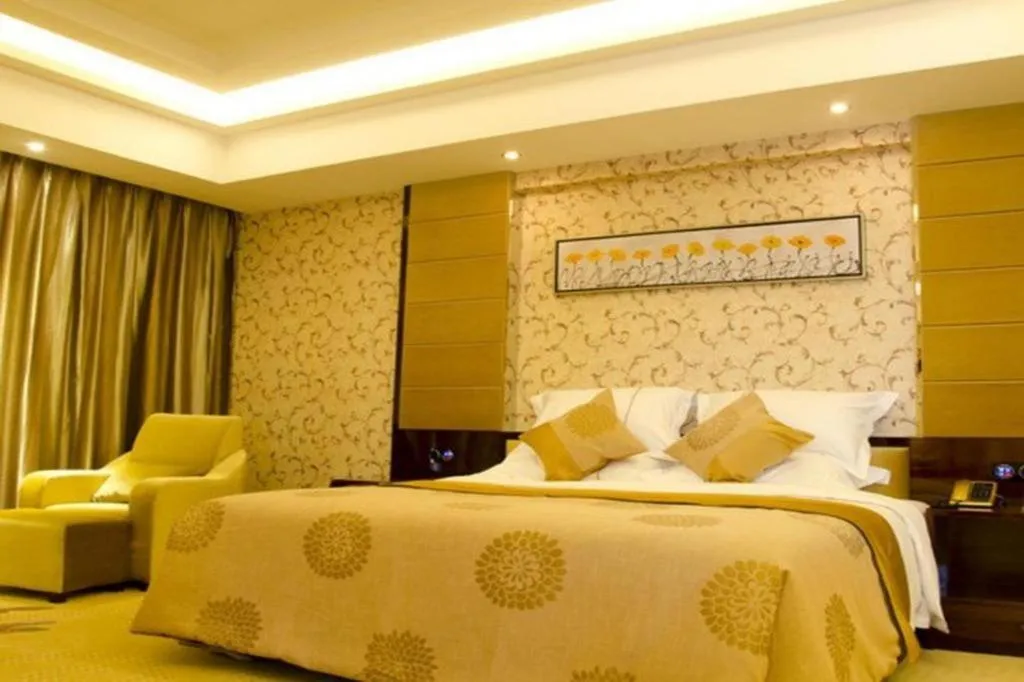Bed in Xin Sheng Da Hong Sheng International Hotel