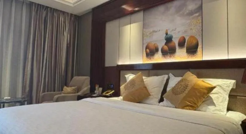 Bed in Xin Sheng Da Hong Sheng International Hotel