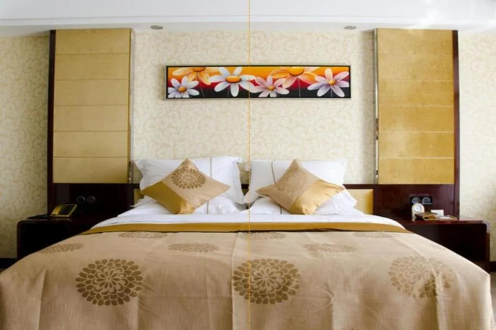 Bed in Xin Sheng Da Hong Sheng International Hotel