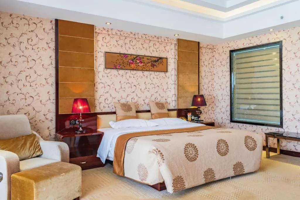 Bed in Xin Sheng Da Hong Sheng International Hotel