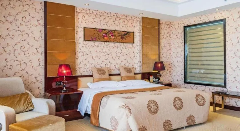 Bed in Xin Sheng Da Hong Sheng International Hotel