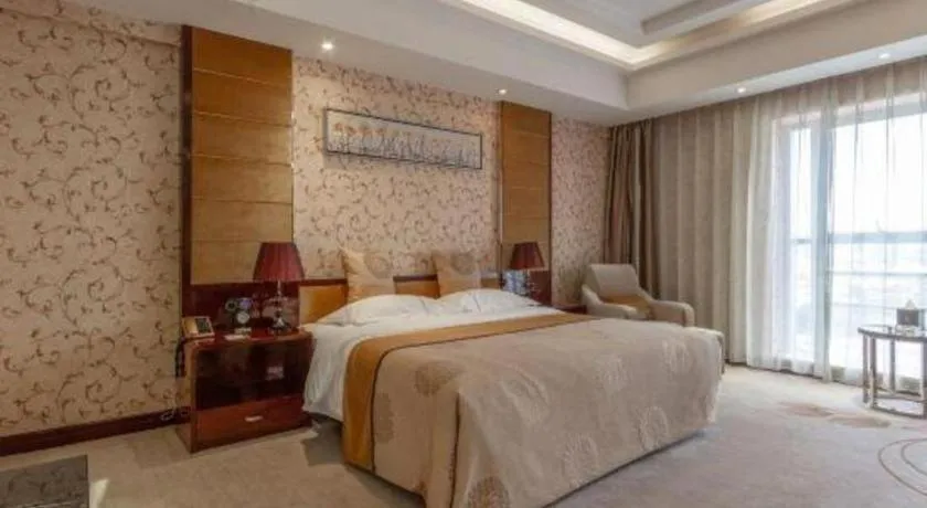 Bed in Xin Sheng Da Hong Sheng International Hotel