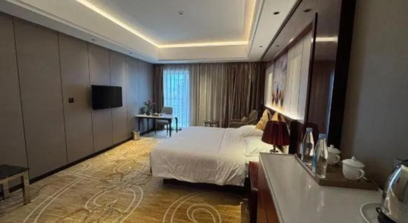 Bed in Xin Sheng Da Hong Sheng International Hotel