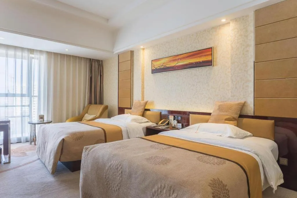 Bed in Xin Sheng Da Hong Sheng International Hotel