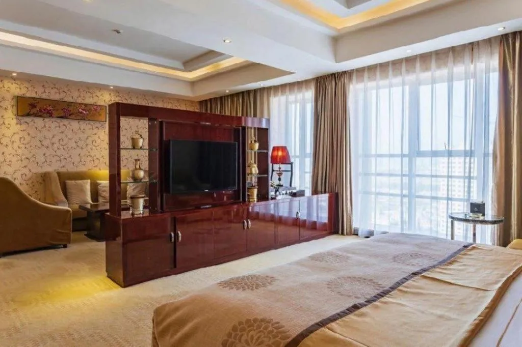 Bed in Xin Sheng Da Hong Sheng International Hotel