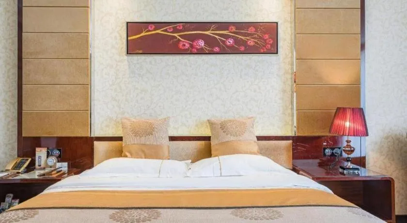 Bed in Xin Sheng Da Hong Sheng International Hotel