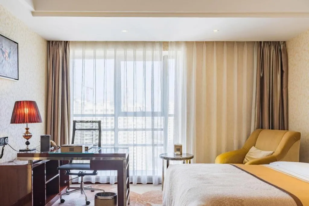 Bed in Xin Sheng Da Hong Sheng International Hotel