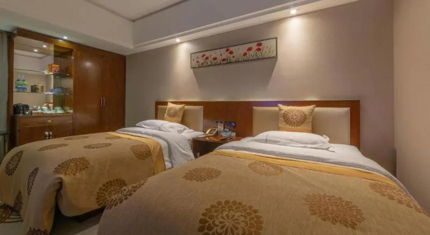 Bed in Xin Sheng Da Hong Sheng International Hotel