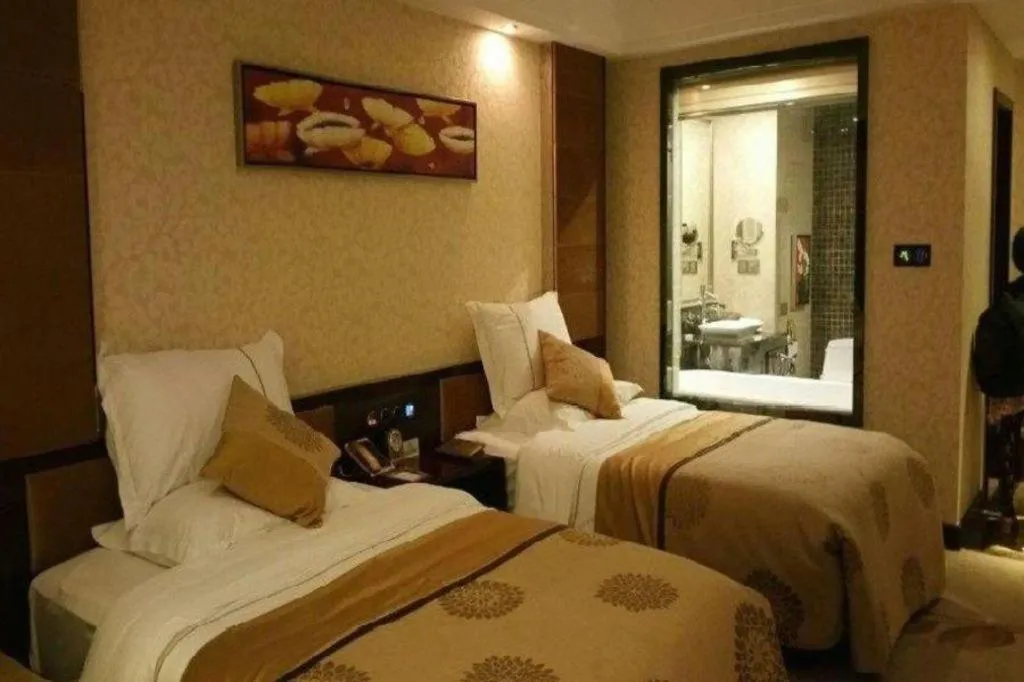 Bed in Xin Sheng Da Hong Sheng International Hotel