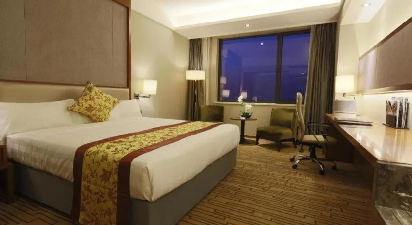 Bed in Shenyang Rayfont International Hotel