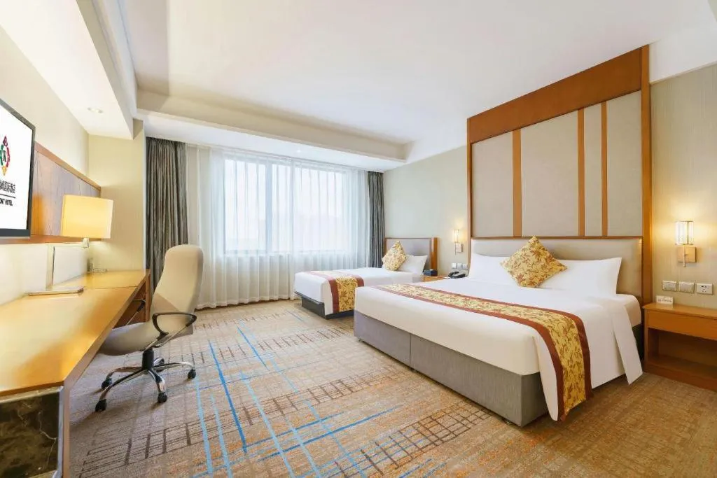 Bed in Shenyang Rayfont International Hotel