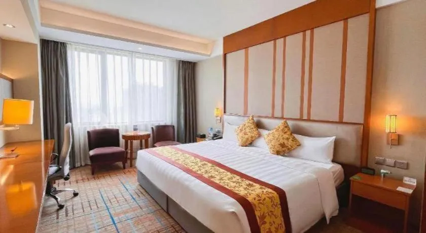 Bed in Shenyang Rayfont International Hotel