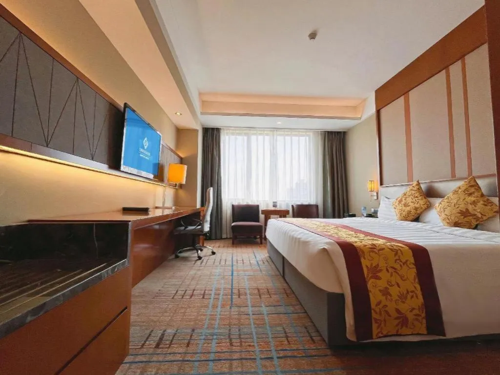 Bed in Shenyang Rayfont International Hotel