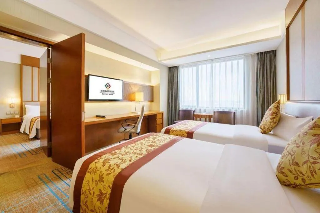 Bed in Shenyang Rayfont International Hotel