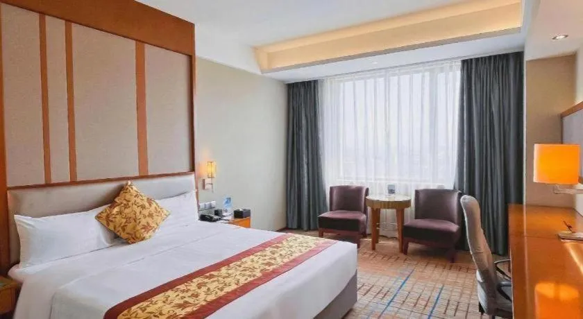 Bed in Shenyang Rayfont International Hotel