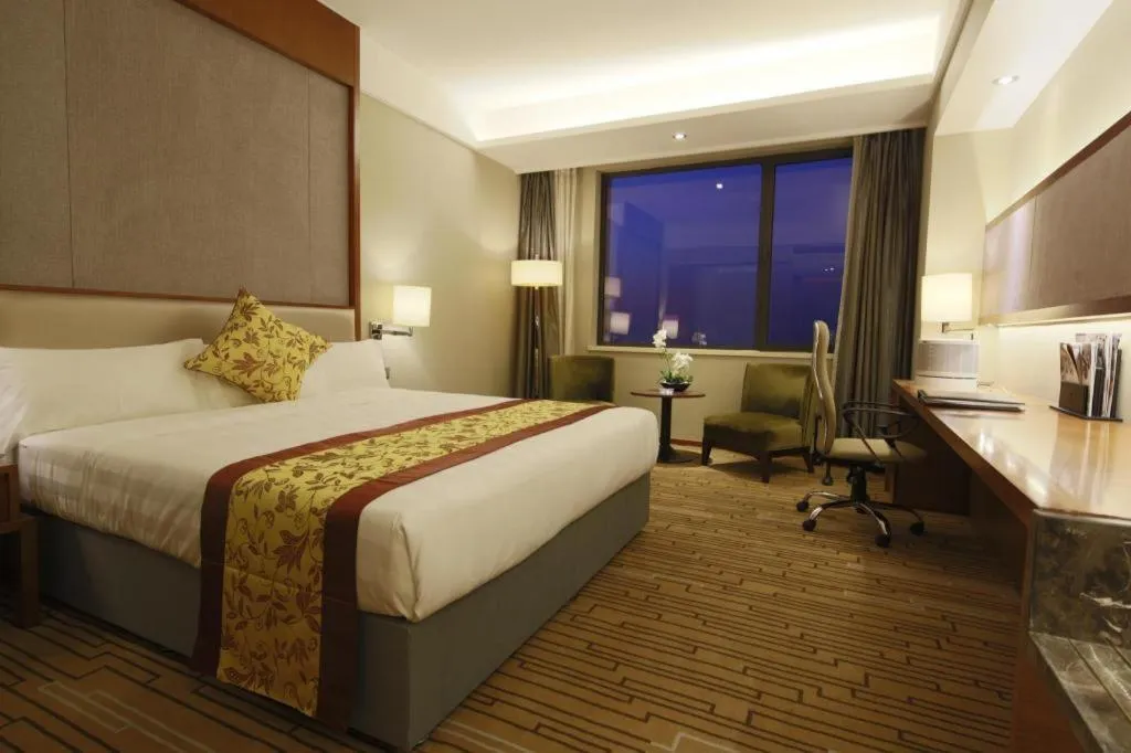 Bed in Shenyang Rayfont International Hotel