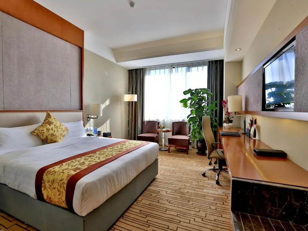Bed in Shenyang Rayfont International Hotel