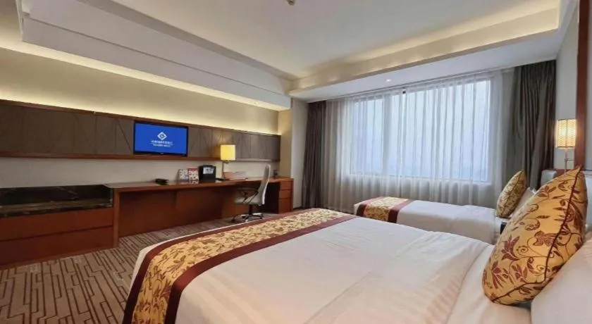 Bed in Shenyang Rayfont International Hotel