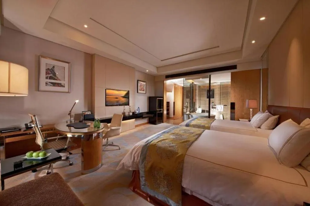 Bed in Grand Parkray Hangzhou Hotel