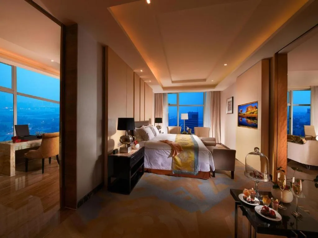 Bed in Grand Parkray Hangzhou Hotel