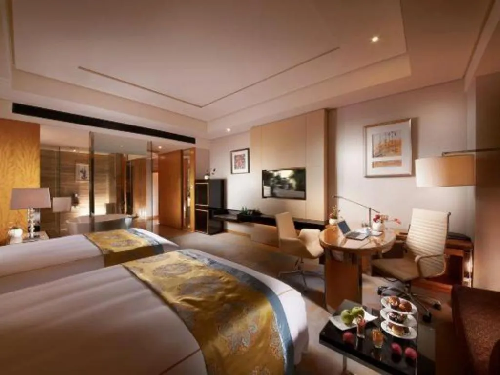 Bed in Grand Parkray Hangzhou Hotel