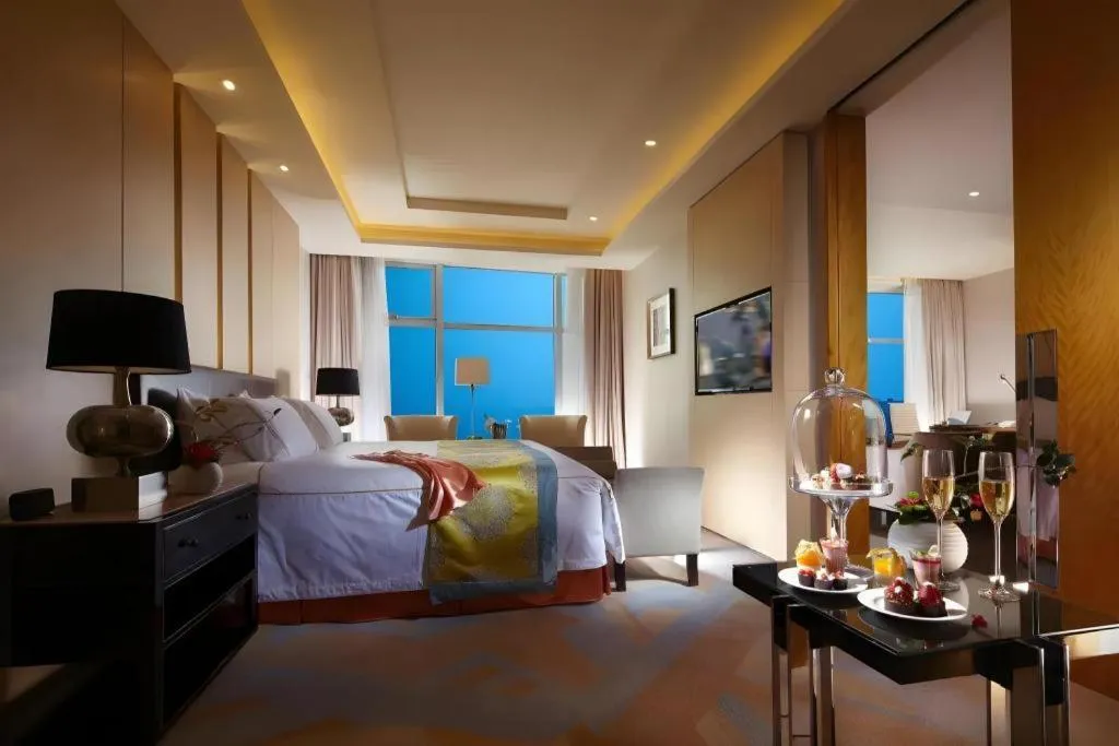 Bed in Grand Parkray Hangzhou Hotel