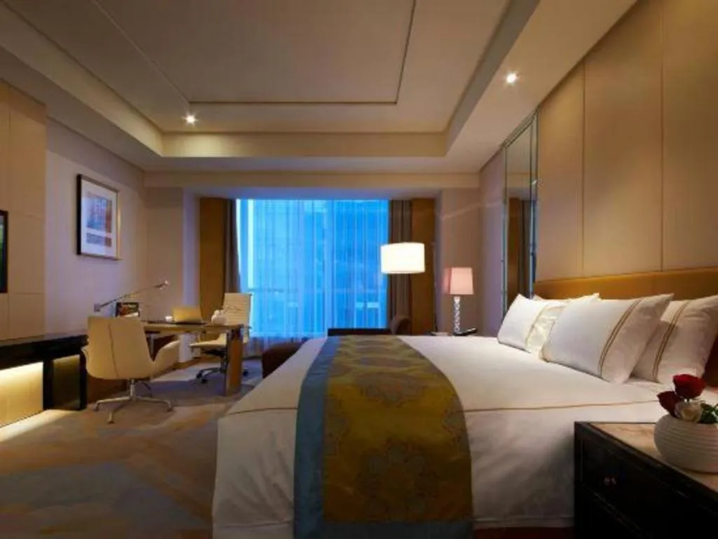 Bed in Grand Parkray Hangzhou Hotel