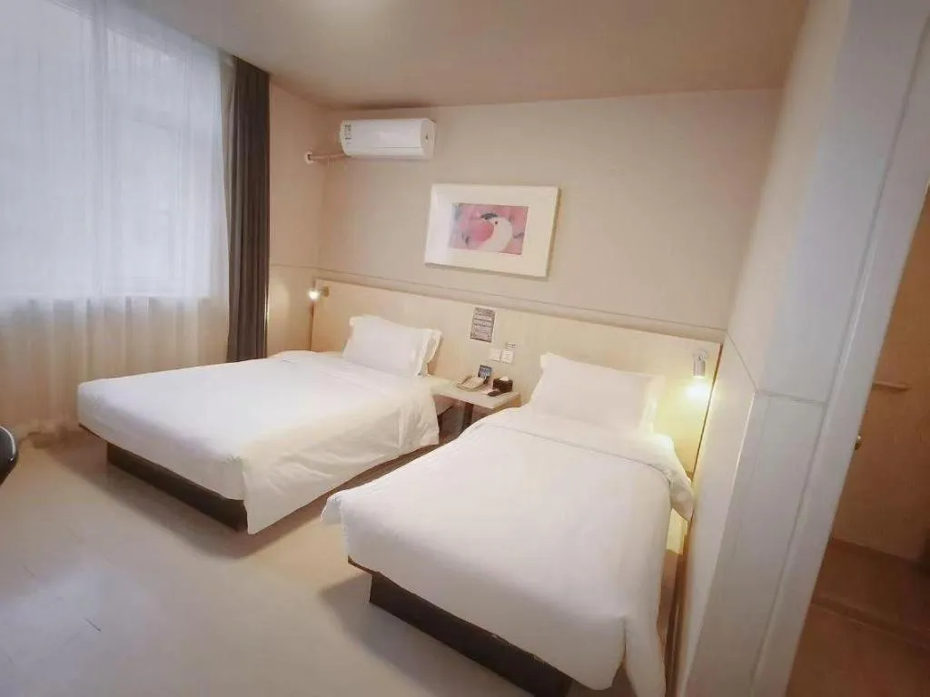 Bed in Jinjiang Inn Beijing Huairou Qingchun Road Wanda Plaza