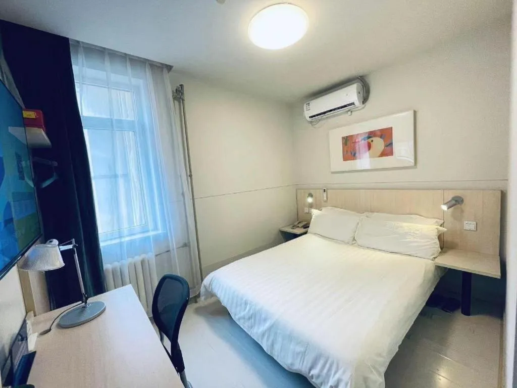 Bed in Jinjiang Inn Beijing Huairou Qingchun Road Wanda Plaza