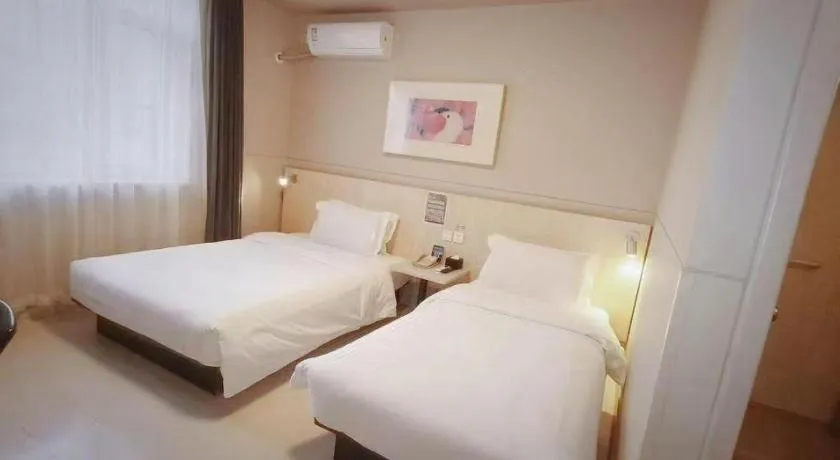Bed in Jinjiang Inn Beijing Huairou Qingchun Road Wanda Plaza