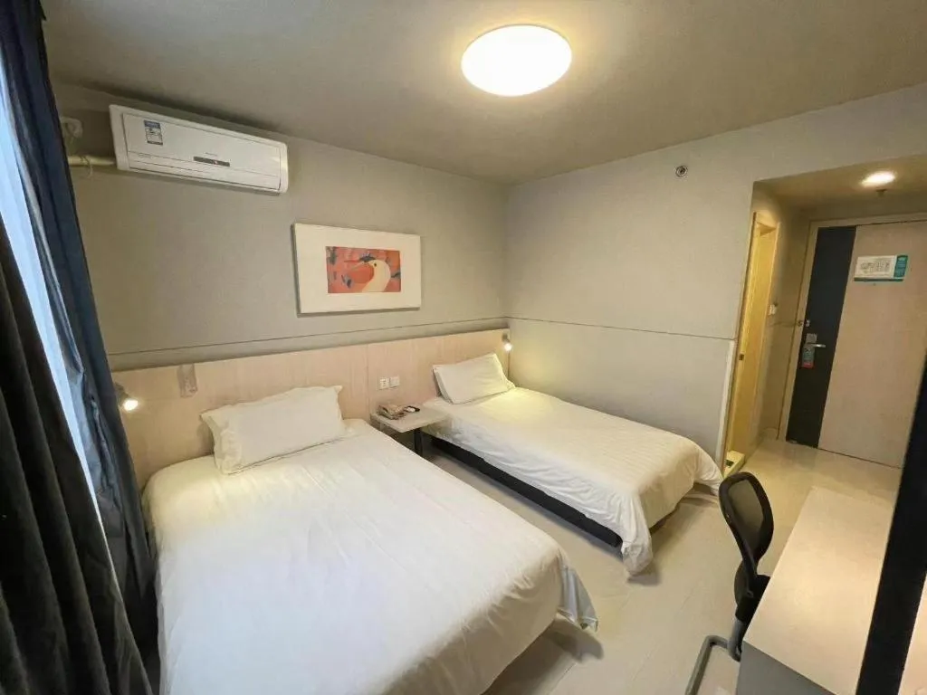 Bed in Jinjiang Inn Beijing Huairou Qingchun Road Wanda Plaza