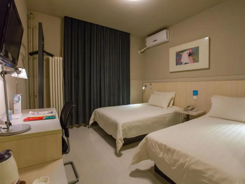 Bed in Jinjiang Inn Beijing Huairou Qingchun Road Wanda Plaza
