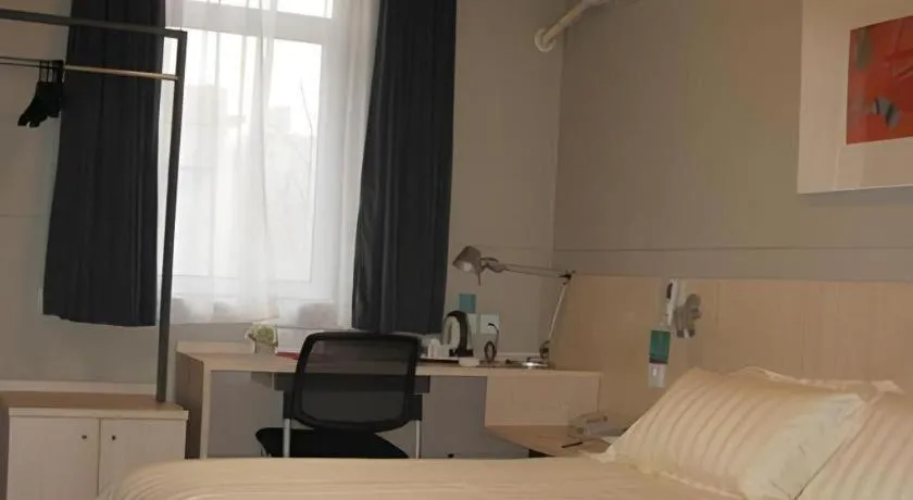 Bed in Jinjiang Inn Beijing Huairou Qingchun Road Wanda Plaza