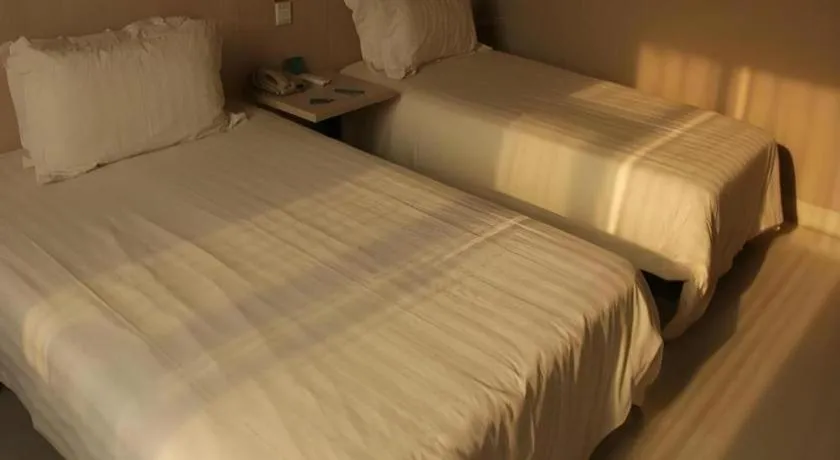Bed in Jinjiang Inn Beijing Huairou Qingchun Road Wanda Plaza