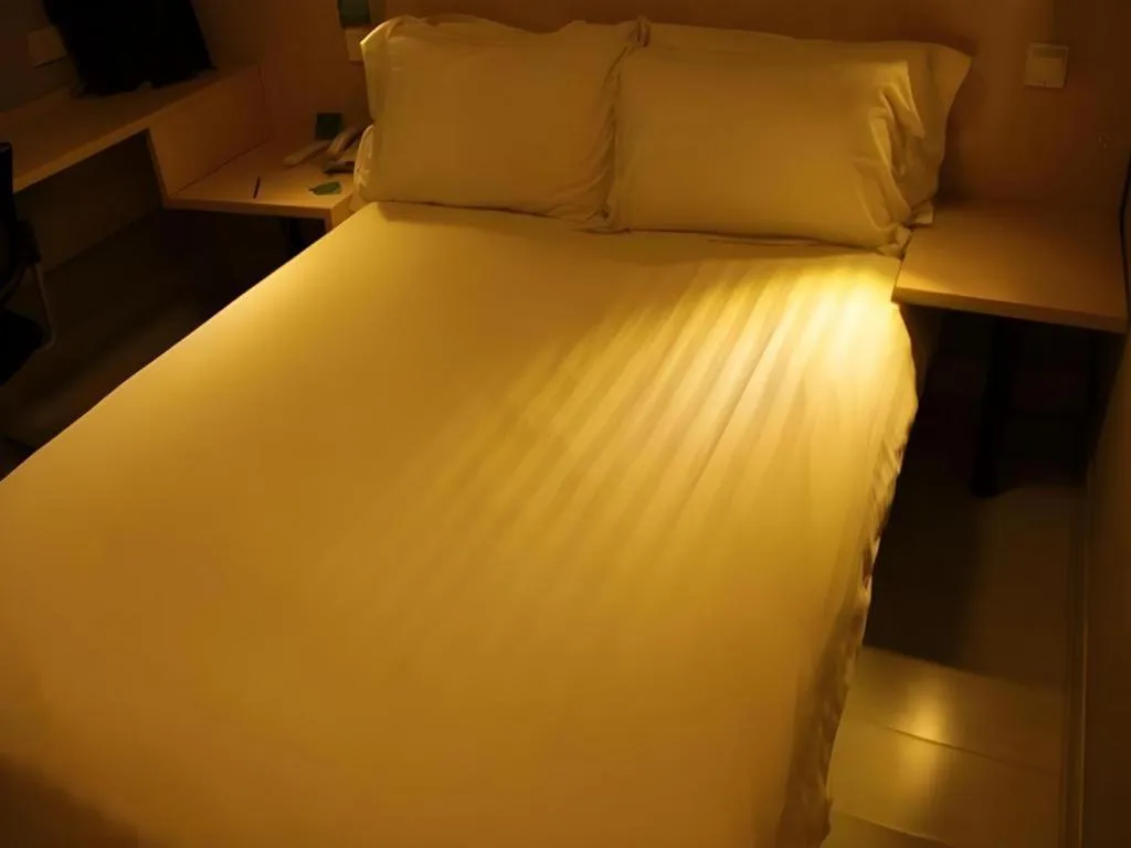 Bed in Jinjiang Inn Beijing Huairou Qingchun Road Wanda Plaza