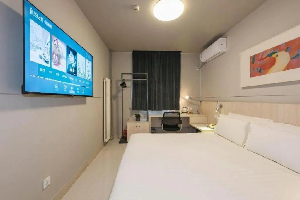 Bed in Jinjiang Inn Beijing Huairou Qingchun Road Wanda Plaza
