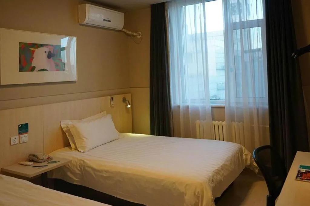 Bed in Jinjiang Inn Beijing Huairou Qingchun Road Wanda Plaza