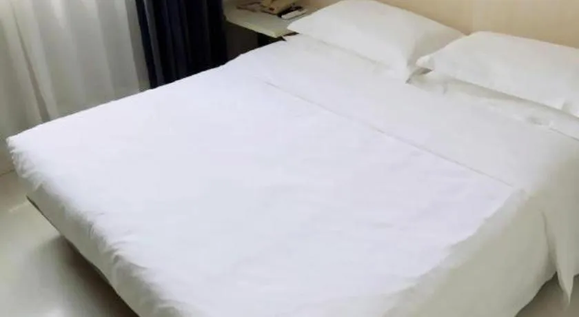 Bed in Jinjiang Inn Beijing Huairou Qingchun Road Wanda Plaza