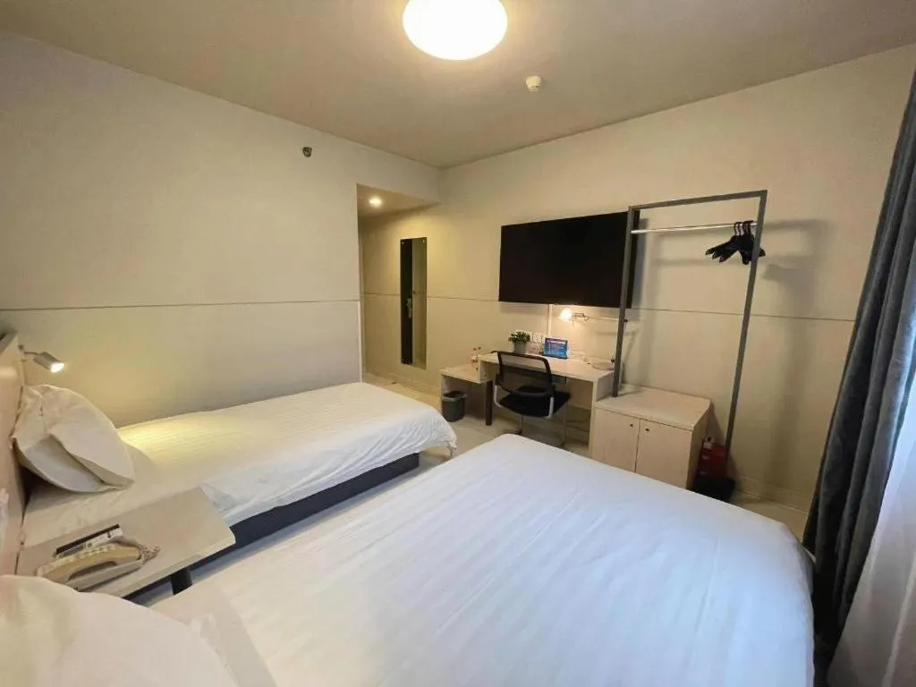 Bed in Jinjiang Inn Beijing Huairou Qingchun Road Wanda Plaza
