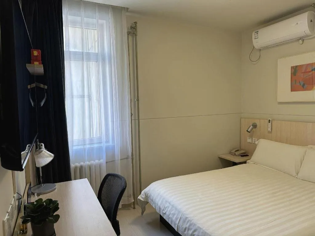 Bed in Jinjiang Inn Beijing Huairou Qingchun Road Wanda Plaza
