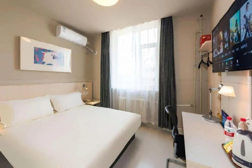 Bed in Jinjiang Inn Beijing Huairou Qingchun Road Wanda Plaza