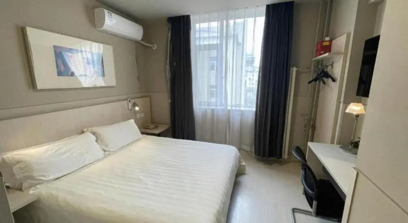 Bed in Jinjiang Inn Beijing Huairou Qingchun Road Wanda Plaza
