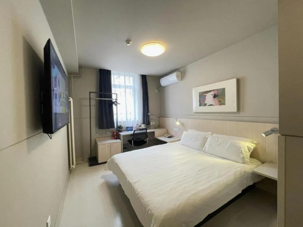 Bed in Jinjiang Inn Beijing Huairou Qingchun Road Wanda Plaza