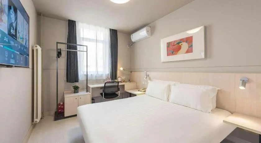 Bed in Jinjiang Inn Beijing Huairou Qingchun Road Wanda Plaza